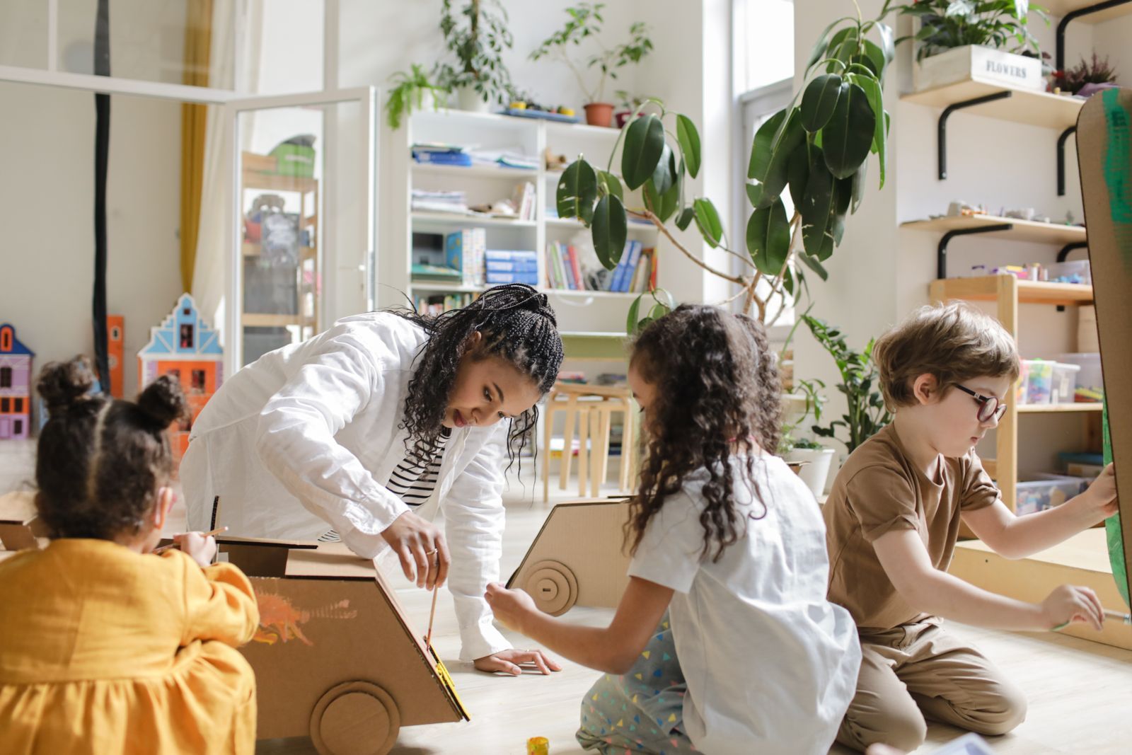 Children playing together in a bright, calm learning space
